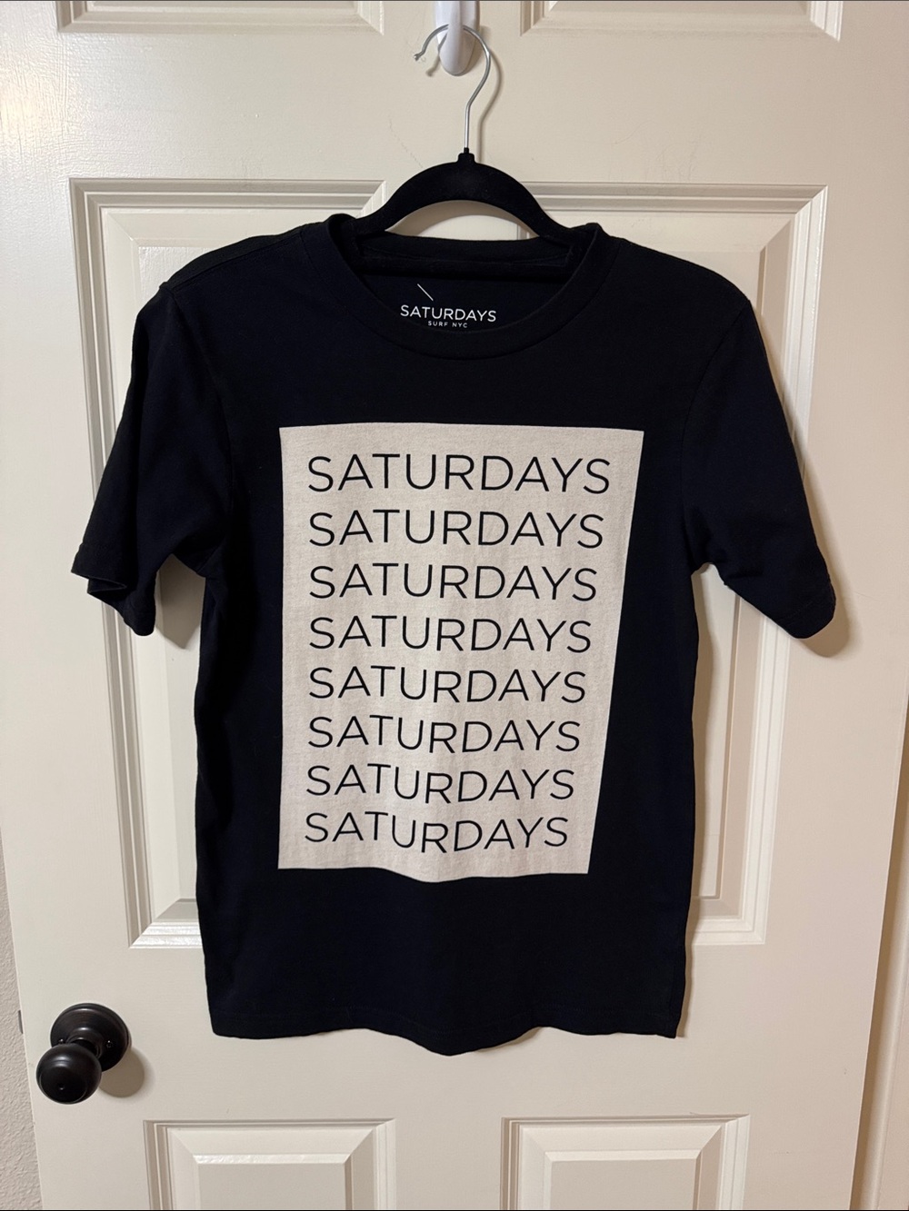 Saturdays New York City Black Tee with White Repeated Logo Panel